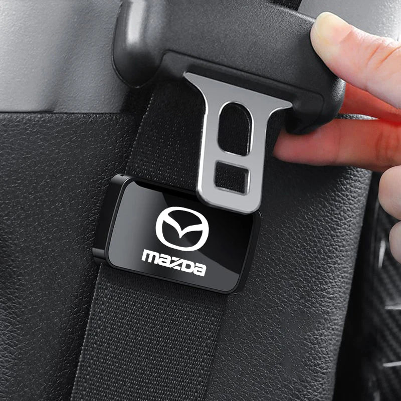 Fixateur magnétique de ceinture - Édition Mazda