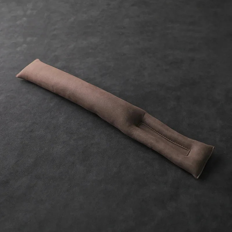 Coussin de remplissage pour interstice de siège en Suédine