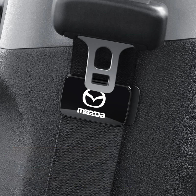 Fixateur magnétique de ceinture - Édition Mazda