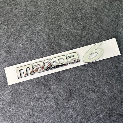 Emblème carrosserie logo badge ABS premium Mazda 3 6 finition chrome noir argent - Mazdrive