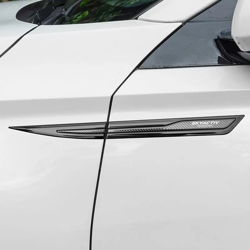 Emblèmes de Garde-boue Latéraux "Skyactiv" Protection & Style
