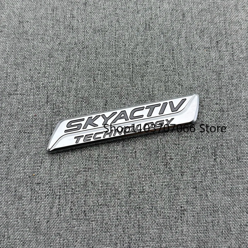 Badge SKYACTIV 3D Chromé ou Noir pour Hayon – Mazda